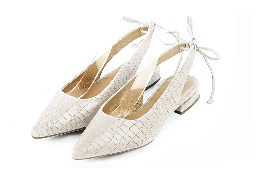 Women's off white elegant slingback heels. Pointed toe. Flat flare heels - Front view